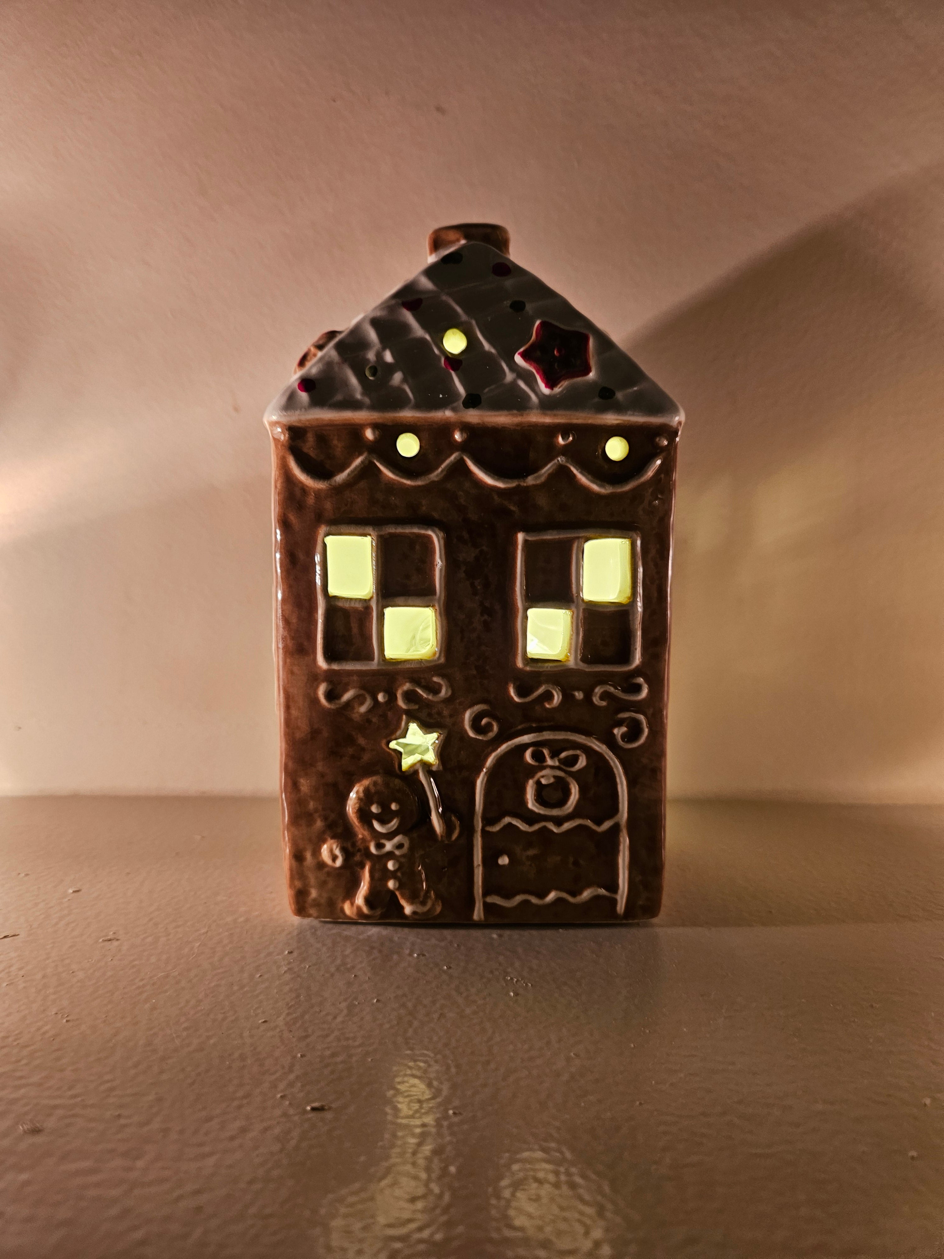 Kersthuisje waar waxinelicht in kan